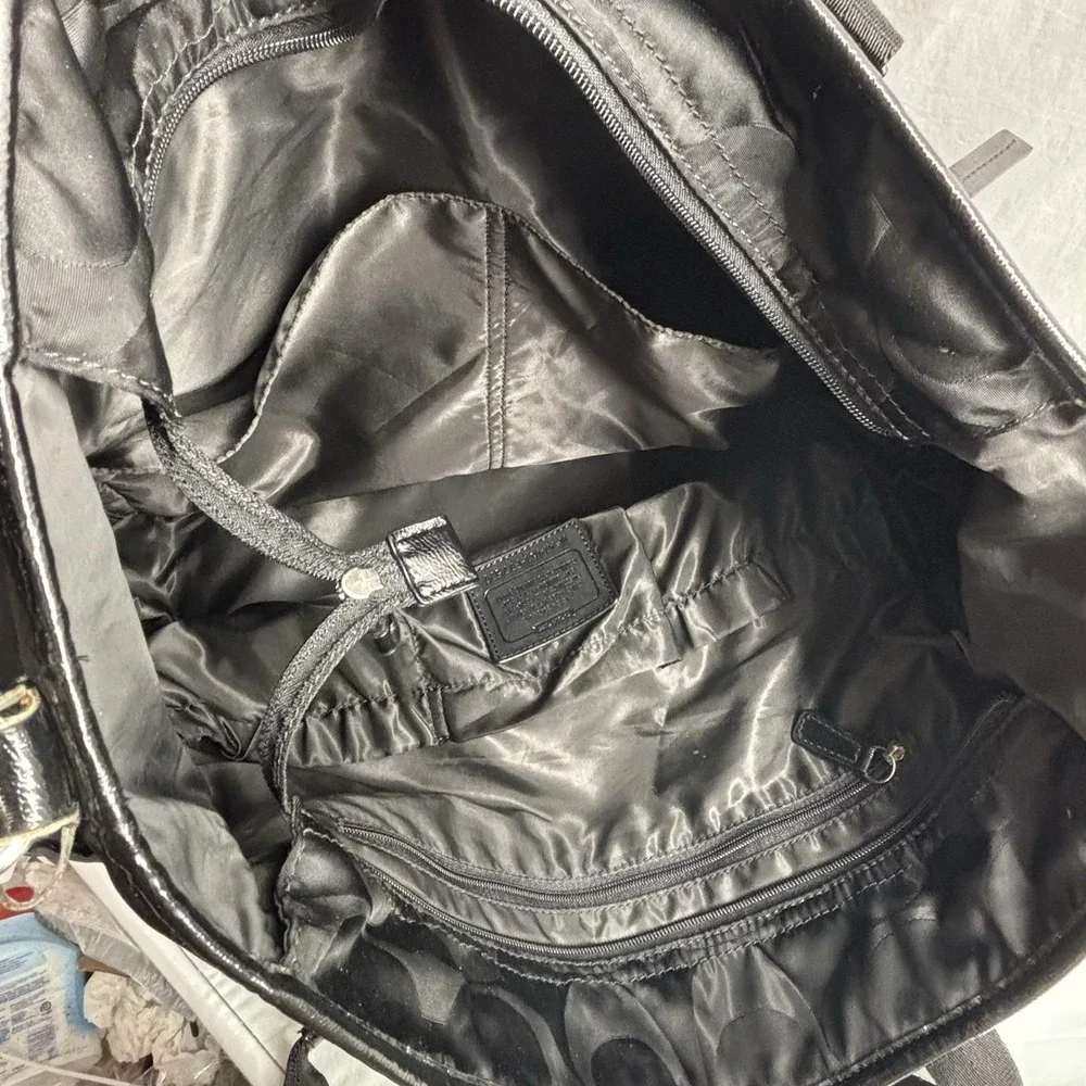 Coach black signature